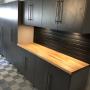 Garage in Ladner BC with Swisstrax, Cabinets and workbench with LED lighting Garage in Ladner BC with Swisstrax, Cabinets and workbench with LED lighting
