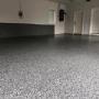 Epoxy flaked floor with polyaspartic top coat Epoxy flaked floor with polyaspartic top coat