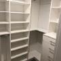Custom walk in closet in Burnaby with drawers to provide optimal storage Custom walk in closet in Burnaby with drawers to provide optimal storage