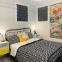 Roman shades can soften the look of a bedroom. Roman shades can soften the look of a bedroom.