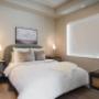 Inlet Station in Port Moody, BC spacious bedroom with large window and hard surface flooring Inlet Station in Port Moody, BC spacious bedroom with large window and hard surface flooring