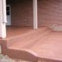 Red colored concrete sidewalk and stairs. Red colored concrete sidewalk and stairs.