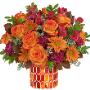 Like falling leaves, each facet of this fabulous stained glass mosaic vase is a unique reflection of autumnal beauty. It bursts with radiant fall roses for a seasonal gift they won't soon forget. Like falling leaves, each facet of this fabulous stained glass mosaic vase is a unique reflection of autumnal beauty. It bursts with radiant fall roses for a seasonal gift they won't soon forget.