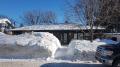 Déneigement de toiture résidentielle