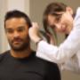 Audiologist, Heather Ritchie, checking a client's ears. Audiologist, Heather Ritchie, checking a client's ears.