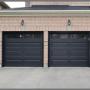 The Door Master- black Raised Ranch Panel garage door with windows The Door Master- black Raised Ranch Panel garage door with windows