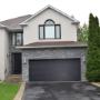 The Door Master- black flush panel garage door with no windows The Door Master- black flush panel garage door with no windows