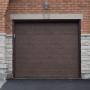 The Door Master- brown flush panel garage door with no windows The Door Master- brown flush panel garage door with no windows