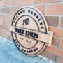 The Den, The Den Pitt Meadows, Meadow Gardens Golf Academy, Small business signage, business logo, wood sign, custom sign The Den, The Den Pitt Meadows, Meadow Gardens Golf Academy, Small business signage, business logo, wood sign, custom sign