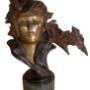 Bust of a Woman - bronze sculpture, of verdigris, gold and brown patina. Signed indistinctly near the base. 22” high, on a circular green marble plinth. Bust of a Woman - bronze sculpture, of verdigris, gold and brown patina. Signed indistinctly near the base. 22” high, on a circular green marble plinth.