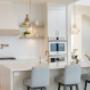 Thoughtful and charming details fill this monochromatic kitchen with life. Thoughtful and charming details fill this monochromatic kitchen with life.