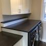 Laundry cabinets and countertops Laundry cabinets and countertops