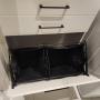 Tilt out laundry hamper in custom closet Tilt out laundry hamper in custom closet