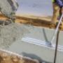 Worker levels cement mortar Worker levels cement mortar