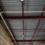Installing UFO high-bay lights in a commercial building. Installing UFO high-bay lights in a commercial building.