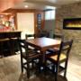 The addition of a stone fireplace completes the space. The addition of a stone fireplace completes the space.