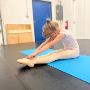 Koraline Davis, a 7-year-old student in NID's junior program, working on her flexibility. Koraline Davis, a 7-year-old student in NID's junior program, working on her flexibility.