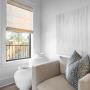 Woven Wood Shades bring warmth and natural texture to this cozy corner, softly filtering light while adding an organic touch to the space. Woven Wood Shades bring warmth and natural texture to this cozy corner, softly filtering light while adding an organic touch to the space.