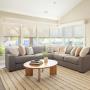 Motorized roller shades in living room. Motorized roller shades in living room.