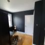Black walls with a white ceiling Black walls with a white ceiling