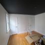 White walls with a black ceiling White walls with a black ceiling