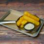 HALLOUMI FRIES - Squeaky Mediterranean cheese fried in Joey's Famous batter served with house made tzatziki and lemon HALLOUMI FRIES - Squeaky Mediterranean cheese fried in Joey's Famous batter served with house made tzatziki and lemon
