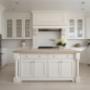 Kitchen renovation with beautifully installed wooded white kitchen cabinets Kitchen renovation with beautifully installed wooded white kitchen cabinets