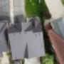 "Aerial view of residential rooftops in Barrie, featuring a range of professionally installed roofing systems, including sleek and durable metal roofs. "Aerial view of residential rooftops in Barrie, featuring a range of professionally installed roofing systems, including sleek and durable metal roofs.