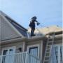 A Metal Roof Experts technician installs a new metal roof on a residential home in Barrie, ensuring secure placement and precision detailing. Safety harnessed and expertly equipped, our team delivers professional craftsmanship from the ground up. A Metal Roof Experts technician installs a new metal roof on a residential home in Barrie, ensuring secure placement and precision detailing. Safety harnessed and expertly equipped, our team delivers professional craftsmanship from the ground up.
