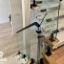 This sophisticated design features a clear glass panel that elegantly sits atop a sturdy spigot mini post. It's the perfect addition to any modern space, providing both style and function in equal measure. This sophisticated design features a clear glass panel that elegantly sits atop a sturdy spigot mini post. It's the perfect addition to any modern space, providing both style and function in equal measure.