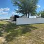 White privacy and ranch rail vinyl fence White privacy and ranch rail vinyl fence