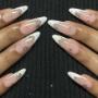 Gel manicure with nail art: Vibrant, chip-resistant color with intricate, hand-painted designs Gel manicure with nail art: Vibrant, chip-resistant color with intricate, hand-painted designs