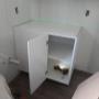 Kitchen cupboards are being installed. Kitchen cupboards are being installed.