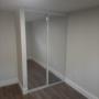 Bedroom 1 closet. All bedroom have sliding doors installed. Bedroom 1 closet. All bedroom have sliding doors installed.