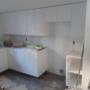 Kitchen cabinets have been installed. There is paper on the floor which is why it looks a different colour. Kitchen cabinets have been installed. There is paper on the floor which is why it looks a different colour.
