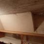 inside cold room. Sloped area is the back of the stairs to front porch. inside cold room. Sloped area is the back of the stairs to front porch.