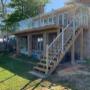 Large deck with aluminum railing and tempered glass. Large deck with aluminum railing and tempered glass.
