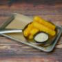 HALLOUMI FRIES - Squeaky Mediterranean cheese fried in Joey's Famous batter served with house made tzatziki and lemon HALLOUMI FRIES - Squeaky Mediterranean cheese fried in Joey's Famous batter served with house made tzatziki and lemon