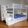 This Full-over-Full Bunk Bed with Stairs is a perfect space-saver for kids or teens. Made from solid pine wood, it comes in white, natural, espresso, and grey finishes. The staircase, with four built-in drawers, can be placed on either side. This Full-over-Full Bunk Bed with Stairs is a perfect space-saver for kids or teens. Made from solid pine wood, it comes in white, natural, espresso, and grey finishes. The staircase, with four built-in drawers, can be placed on either side.