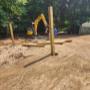 SPM Landscape & Excavation setting 6x6 fence posts for a new fence using our mini-excavator with an auger bit SPM Landscape & Excavation setting 6x6 fence posts for a new fence using our mini-excavator with an auger bit