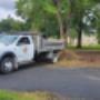 SPM Landscape & Excavation truck delivering topsoil to a job site SPM Landscape & Excavation truck delivering topsoil to a job site