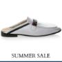 Elegant white sandal with vibrant orange straps, crafted from premium materials for comfort and style. Perfect for adding a pop of color to any ensemble. Elegant white sandal with vibrant orange straps, crafted from premium materials for comfort and style. Perfect for adding a pop of color to any ensemble.