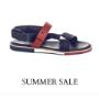 Elegant high-end sandals featuring a striking blend of deep blue and bold red hues, crafted with premium materials for superior comfort and style. Perfect for making a vibrant fashion statement. Elegant high-end sandals featuring a striking blend of deep blue and bold red hues, crafted with premium materials for superior comfort and style. Perfect for making a vibrant fashion statement.